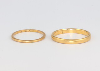 Two 22ct yellow gold wedding bands 4.6 grams, sizes J and P 