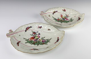 A pair of 18th Century Worcester leaf shaped dishes decorated with exotic birds and butterflies 34cm 