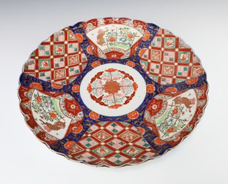 A 19th Century Japanese Imari bowl with panel decoration 46cm 