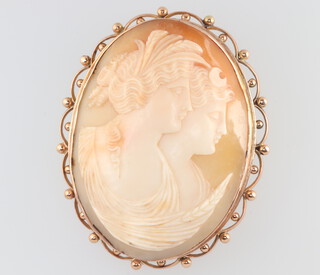 A yellow metal 9ct mounted double portrait cameo brooch 50mm x 40mm 