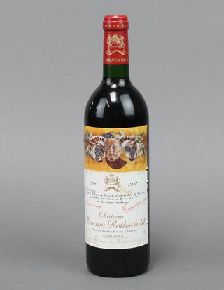 A bottle of 1987 Chateau Mouton Rothschild Pauillac red wine