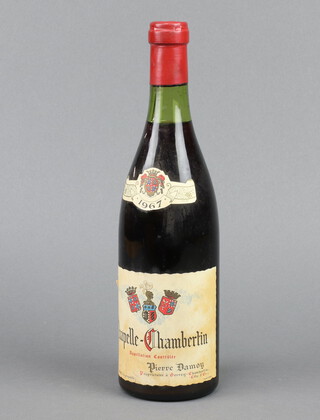 A bottle of 1967 Chapelle Chambertin Grand Cru Pierre Damoy red wine (low on neck)