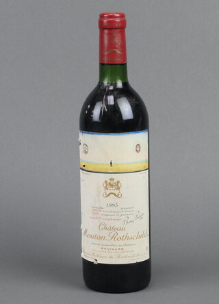 A bottle of 1983 Chateau Mouton Rothschild Pauillac red wine 