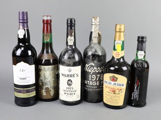 A bottle of 1960 Calem port, a bottle of 1975 Warre's vintage port, a bottle of 1978 Niepoort port, bottle of Pocas Junior porto, bottle of Douro Valley port and a half bottle of Taylors Finest Estate port 