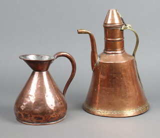 An Eastern copper and brass jug with hinged lid 34cm h together with a copper harvest measure 20cm x 15cm 