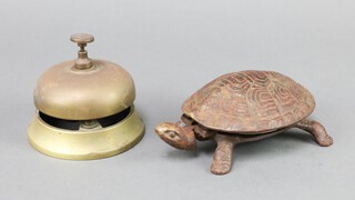 A table bell in the form of a tortoise 4cm x 14cm x 10cm and 1 other table bell 8cm 