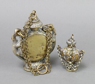 An Eastern gilt metal twin handled flask with lizard handles 13cm and 1 other lidded flask 7cm 