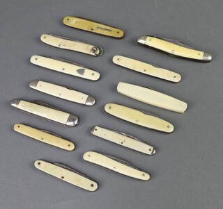 Twelve double bladed folding knives with simulated ivory grips including Kichland, George Wostenholm, Lockwood, John Watte, J Stead & Co, Herbert Robinson, Richards Lamppost, 1 marked stainless, 4 illegible and a single bladed knife marked The Grarton Midget 