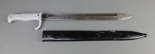 An Imperial German Pioneers sawback bayonet (butcher bayonet), the blade marked Waffenfabrik Mauser A.G Oberndorf complete with scabbard      