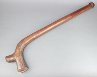 A 19th Century Fijian Kiakavo (or gun stock) cutting club, terminating in a domed knop, 90cm 