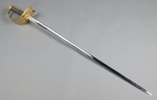 Wilkinson Sword, an Elizabeth II Irish Guards Officer's sword, the blade etched battle honours 