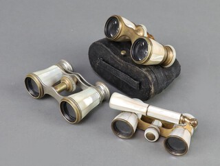 A pair of gilt metal opera glasses marked Busch complete with carrying case, 1 other pair marked Bolaffi Rome (some damage) and 1 other pair