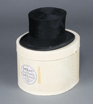 Austin Reed, a gentleman's black top hat size 6 7/8  contained in a Lock & Co, cardboard box 