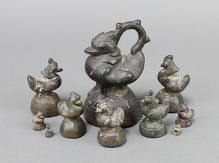 Ten 19th Century Burmese Hintha bird opium weights 