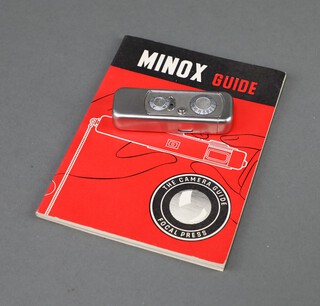 A Minox B spy camera, marked VEF Minox, Riga, Made in Latvia complete with the Minox Guide by Focal Press 8cm x 2cm x 1cm 
