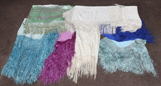 Eight shawls with deep fringes 