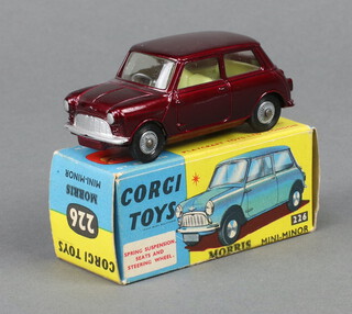 Corgi toys, a die cast metallic maroon Morris Mini Minor 226 with lemon seats, boxed