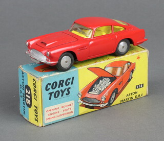 Corgi toys, an Aston Martin DB4 in red 218, boxed 