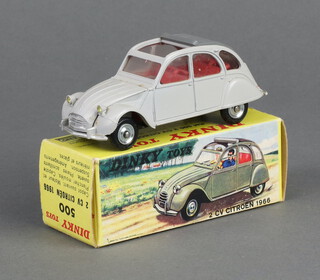 French Dinky Toys  a Citroen 2CV 500 in pale grey with mid grey top and unpainted hubs with Spanish picture box copy box 