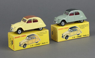 French Dinky Toys, a Citroen 2CV 558 in yellow and brown together with another 558 in green with black roof, both with picture boxes (one box a copy)