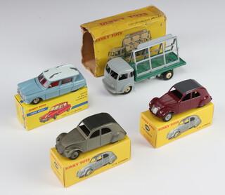 French Dinky Toys, a Citroen Ami 6 first type pale blue and white roof (serious flaking to roof) with later box, a Miroitier Simca "Cargo" Glaziers Truck 33-C with original damaged early box (missing flaps), a Citroen 2CV 24T (535) in metallic grey with copy box, a Citroen 2CV 535 in maroon with copy box