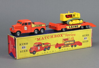 Matchbox toys, a Kingsize K8 Tractor and Transporter by Lesney. The tractor and transporter with thick lettered "Laing" and rectangular door decals, boxed