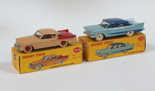 Dinky Toys, a 178 Plymouth Plaza, light blue body, dark blue roof and flash in type 2 box with colour spot ( missing inner flaps and impression mark to trunk ) together with a 169 Studebaker Golden Hawk in tan with red rear panel and hubs in type 2 box with correct colour spot (rubbing to roof)