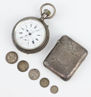 An Edwardian silver engine turned vesta with scroll decoration Birmingham 1909 together with a white metal mechanical pocket watch the dial inscribed Centennial 50mm (not working) 