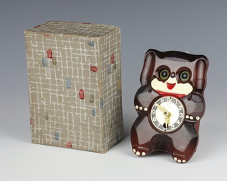 A Japanese Mi-Ken Dog-3 clock, boxed and complete with key and pendulum  