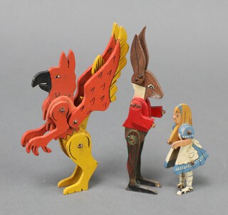 Talfourd Toys, Reigate, a collection of 3 articulated toys from Alice in Wonderland including The Griffin, Alice and The Rabbit 