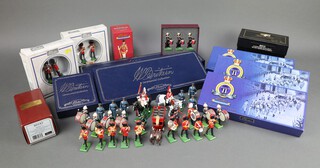 Modern Britains, a collection of various collector sets to include 00089 Sentry Box and Scots Guard, 8312 Coldstream Guards Officer and Drum Major, 8311 Coldstream Guard Band Trumpets, 40318 Drum Major in state dress, 40343 Henry V, 8913 Howitzer with 4 Man Detachment, 3108 The Royal Marines and 3 additional side drummers, 40264 Band of The 7th Hussars set 1, 40265 Band of The 7th Hussars set 2, 40294 Band of The 7th Hussars set 3, 00157 Band of The Life Guards (5 piece) and 00154 Band of The Life Guards (8 piece), together with loose figures including Queens Colour Squadron Royal Air Force, Royal Scots Dragoon Guards, 2 Lifeguards, Band of The Royal Marines and an Oxo omnibus   