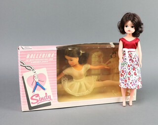 Sindy, a boxed ballerina doll, doll is still attached to the inlay card, the window is yellowing and torn, together with another Sindy doll 