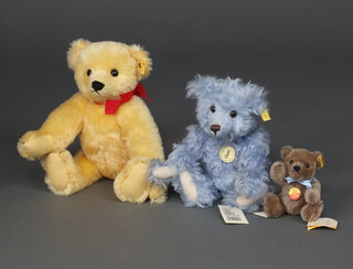 Three small Steiff bears including 0165/38 with voice box, 005060 with squeeze box and 0202/15 