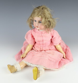 An Armand Marseille bisque headed doll numbered 390 A 4 1/2M 