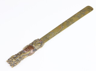 A Japanese Meiji period polished paper knife decorated with birds 30cm