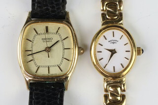 A lady's gilt cased Rotary wristwatch on a gilt bracelet and a Seiko quartz wristwatch 