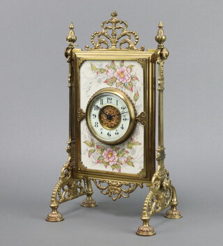 A Victorian timepiece with enamelled dial, Roman numerals, contained in a gilt metal case and with floral patterned porcelain plaque to the centre 38cm h x 21cm w x 15cm d, complete with key  