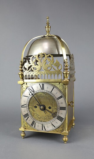 A 19th Century, 17th Century style double fusee chain driven lantern clock with 16cm silvered dial, Roman numerals, contained in a gilt metal case striking on a bell 42cm h x 18cm w x 18cm d  