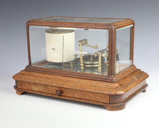 An Edwardian barograph contained in an oak and bevelled glass case, the base fitted a drawer 24cm h x 39cm w x 23cm d 