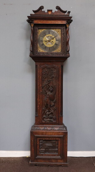 John Varley, an 18th Century 8 day striking longcase clock, the 31cm gilt dial with Roman numerals and gilt spandrels, phases of the moon dial, calendar aperture, contained in a later carved oak case decorated a figure of St Michael defeating the devil 212cm h, together with 3 pendulums, 4 weights and a key  