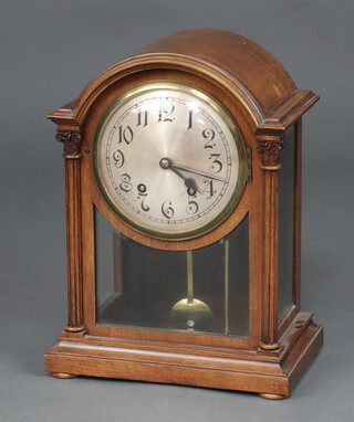 Winterhalder and Hofmeier, a striking on 2 gongs bracket clock with 15cm silvered dial Arabic numerals, contained in an arched mahogany case, complete with pendulum   (no key) 37cm h x 28cm w x 17cm d  