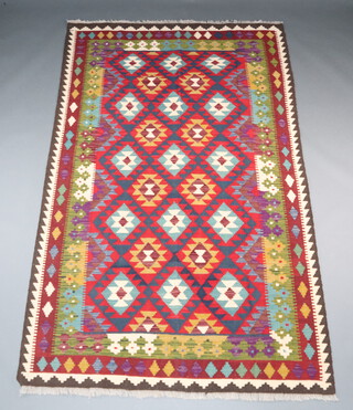 A red, green, blue and white ground Maimana Kilim runner with all over diamond design 251cm x 153cm 