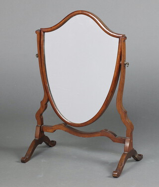 A Sheraton style shield shaped plate dressing table mirror contained in a mahogany swing frame 58cm h x 41cm w x 25cm d 