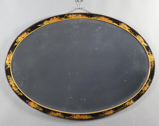 A 1930's oval bevelled plate wall mirror contained in a black lacquered chinoiserie style frame 56cm x 81cm 