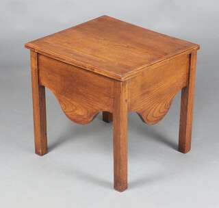 A 19th Century rectangular oak commode with hinged lid and shaped apron, raised on square supports 46cm h x 48cm w x 43cm d 