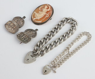 A silver bracelet, 1 other, 2 badges and a cameo brooch, 94 grams