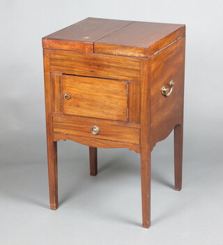 A Georgian mahogany enclosed wash stand the hinged lid revealing a recess, 2 brass carrying handles to the sides, fitted a cupboard enclosed by a panelled door with drawer below, raised on square tapered supports 80cm h x 48cm w x 48cm d 