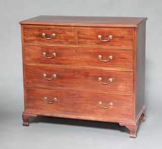 A Georgian mahogany chest of 2 short and 2 long drawers with original brass swan neck drop handles, raised on bracket feet 115cm h x 113cm w x 56cm d 