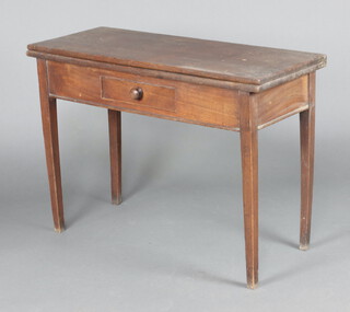 A rectangular Georgian oak tea table fitted a drawer, raised on square supports 70cm h x 101cm w x 40cm d 