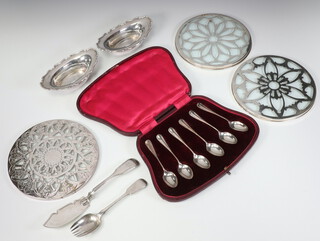 A set of 6 Edwardian silver coffee spoons in a fitted case Sheffield 1906, a pair of silver bon bon dishes Sheffield 1906, silver butter knife, fork and 2 silver mounted glass kettle stands, weighable silver 260 grams, together with plated kettle stand 